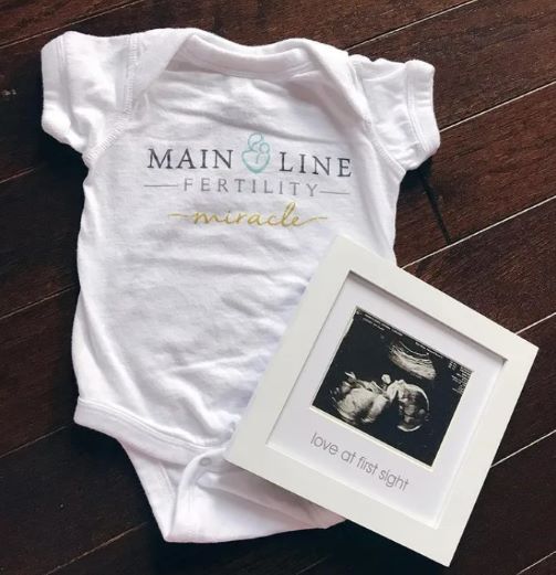 main line fertility baby onesie